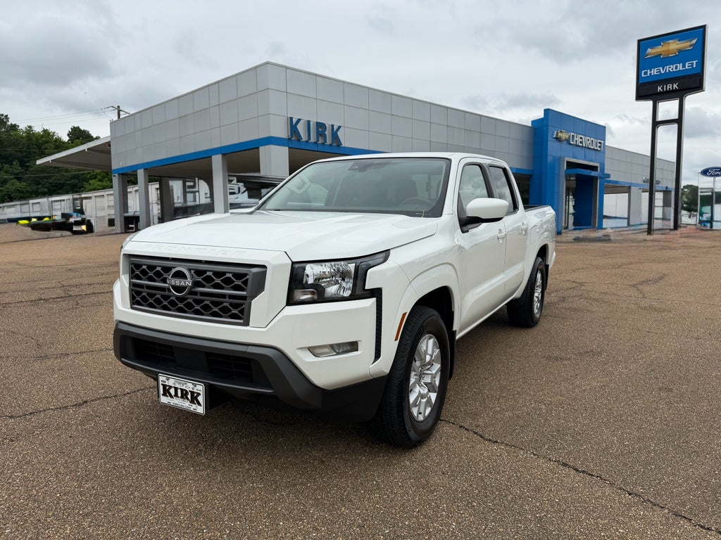 2024 Nissan Frontier SV in White — front three-quarter view