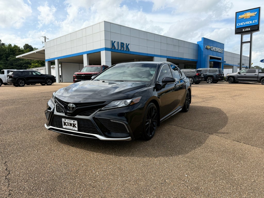 2023 Toyota Camry XSE in Black — front three-quarter view