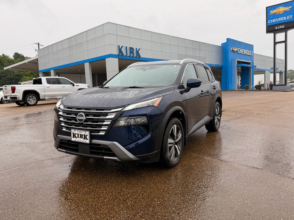 2025 Nissan Rogue SL in Blue — front three-quarter view