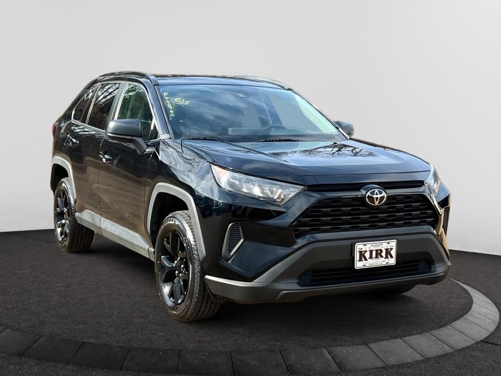2021 Toyota RAV4 LE in Midnight Black Metallic — front three-quarter view