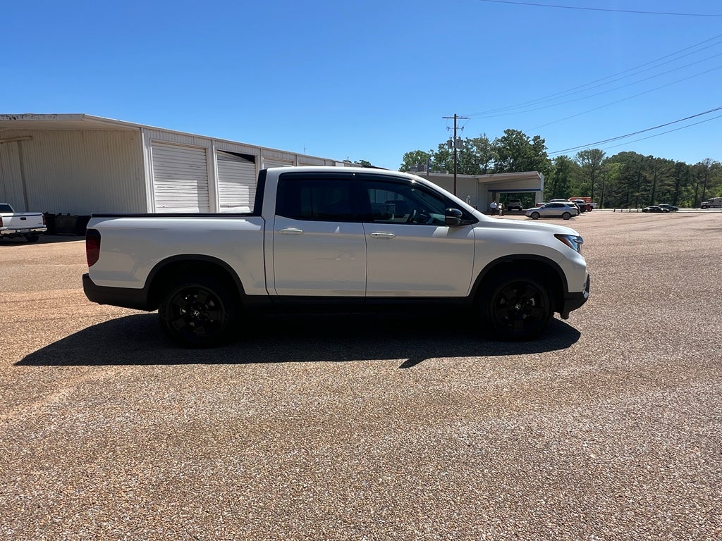 2025 Honda Ridgeline — rear three-quarter view